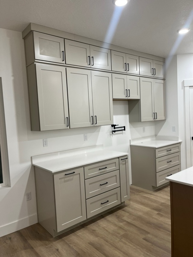Kitchen with custom cabinets and pony wall countertop